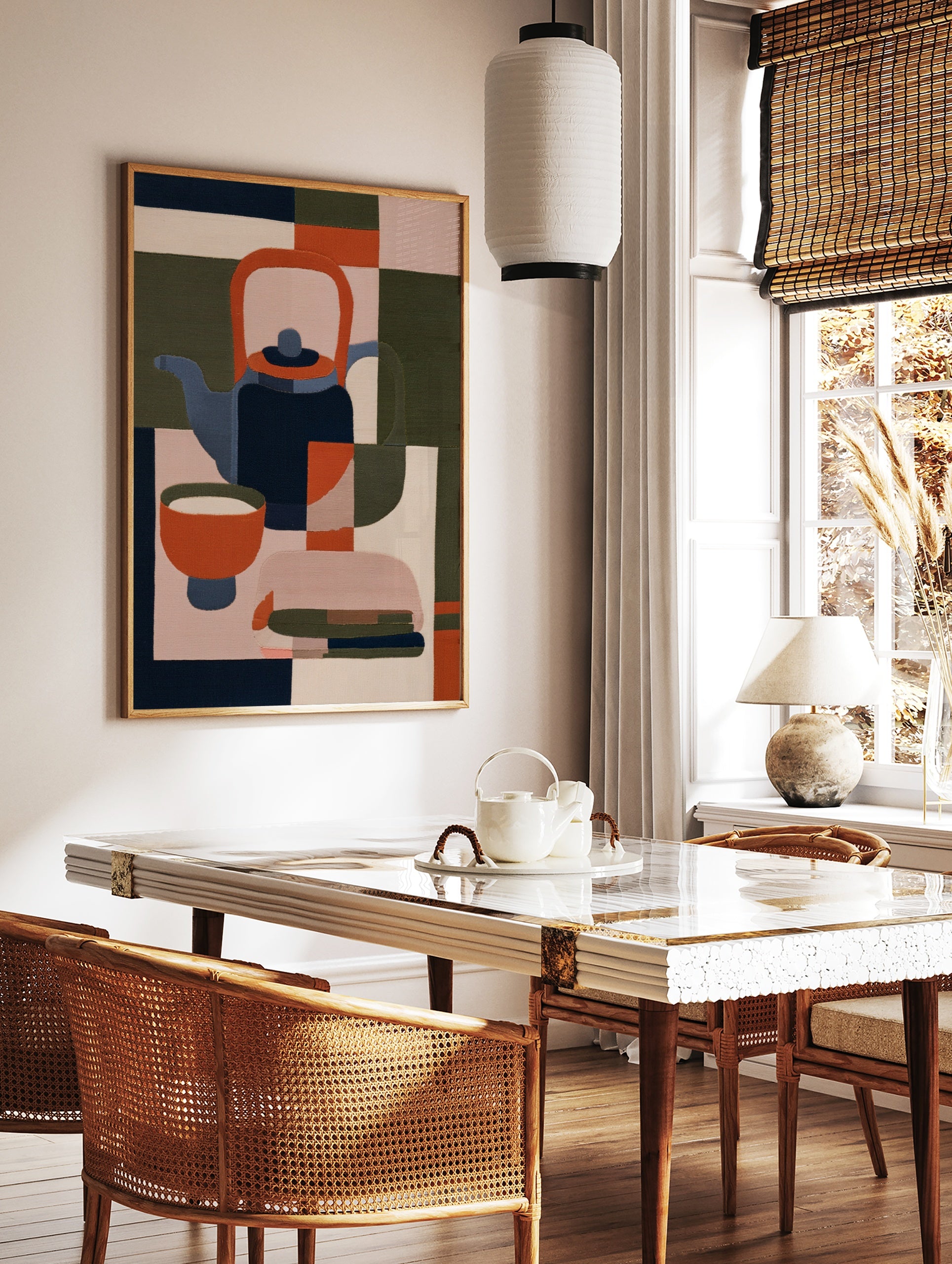 Minimalist geometric illustration of a teapot and bowl in navy, orange, and olive green on a, in a styled room mockup