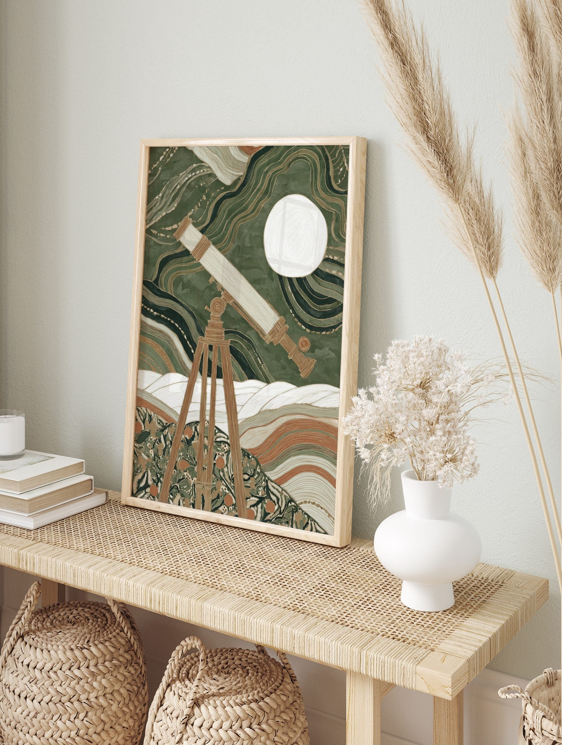 Vintage telescope on tripod observing a white moon against swirling green and gold patterns, in an alternate framed mockup