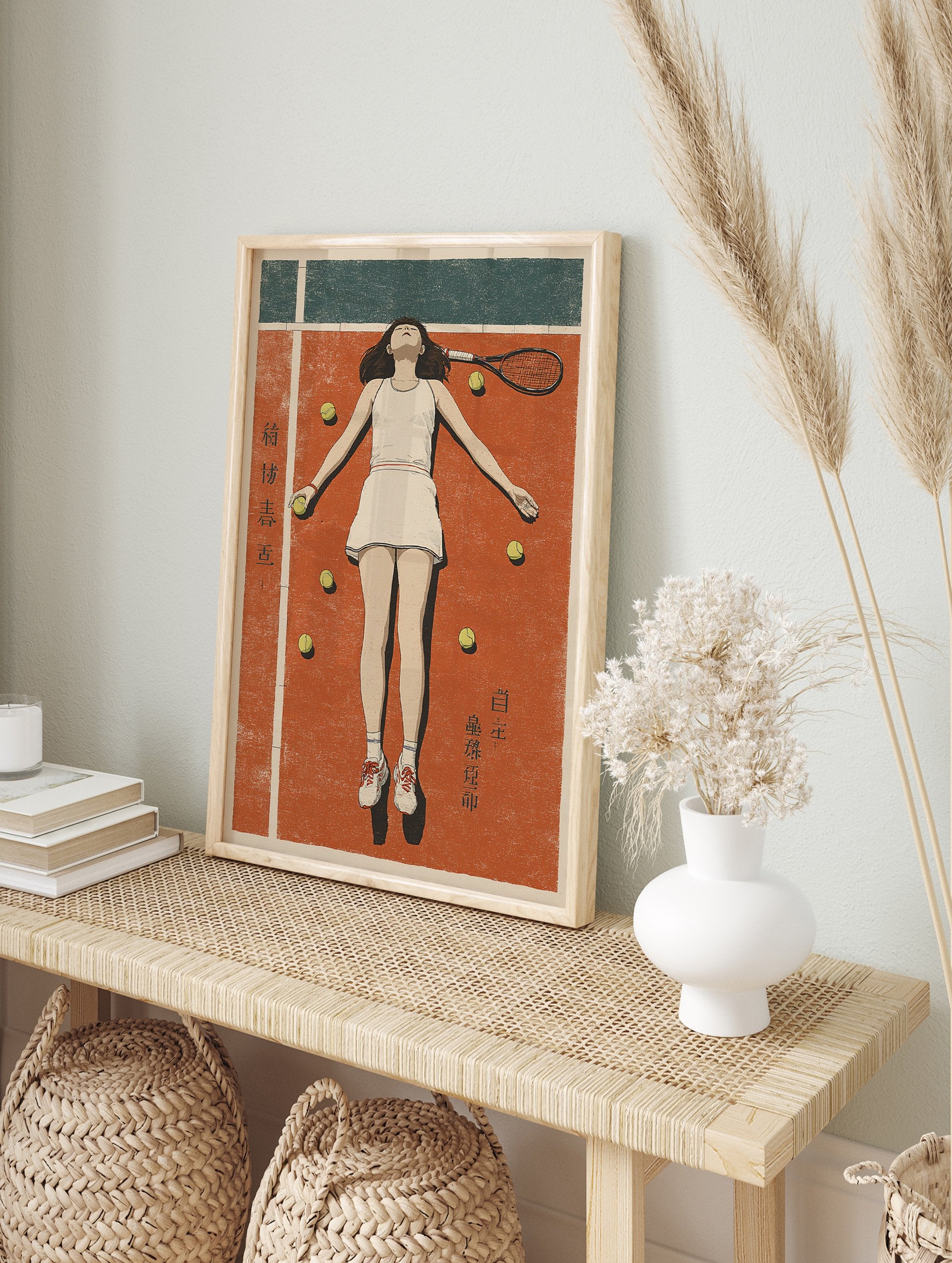 Retro tennis wall art print showing a female tennis player lying on a red clay court with tennis balls and a racket. - Image 3