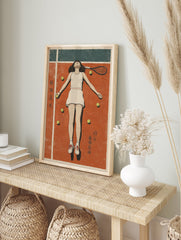 Retro tennis wall art print showing a female tennis player lying on a red clay court with tennis balls and a racket. - Image 3