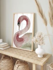 Illustrative swan art print with a curved neck in terracotta and muted green tones on a white, in an alternate framed mockup