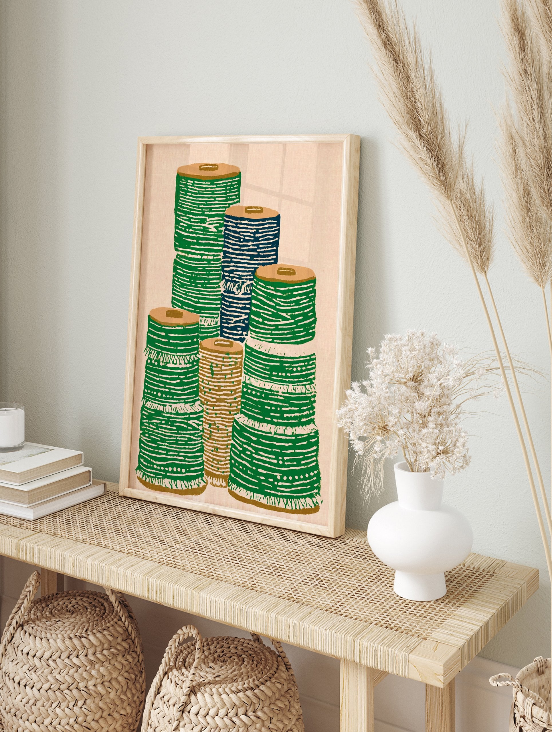Illustrative textile spool wall art print showing stacks of green, blue, and brown spools on a light background. - Image 3
