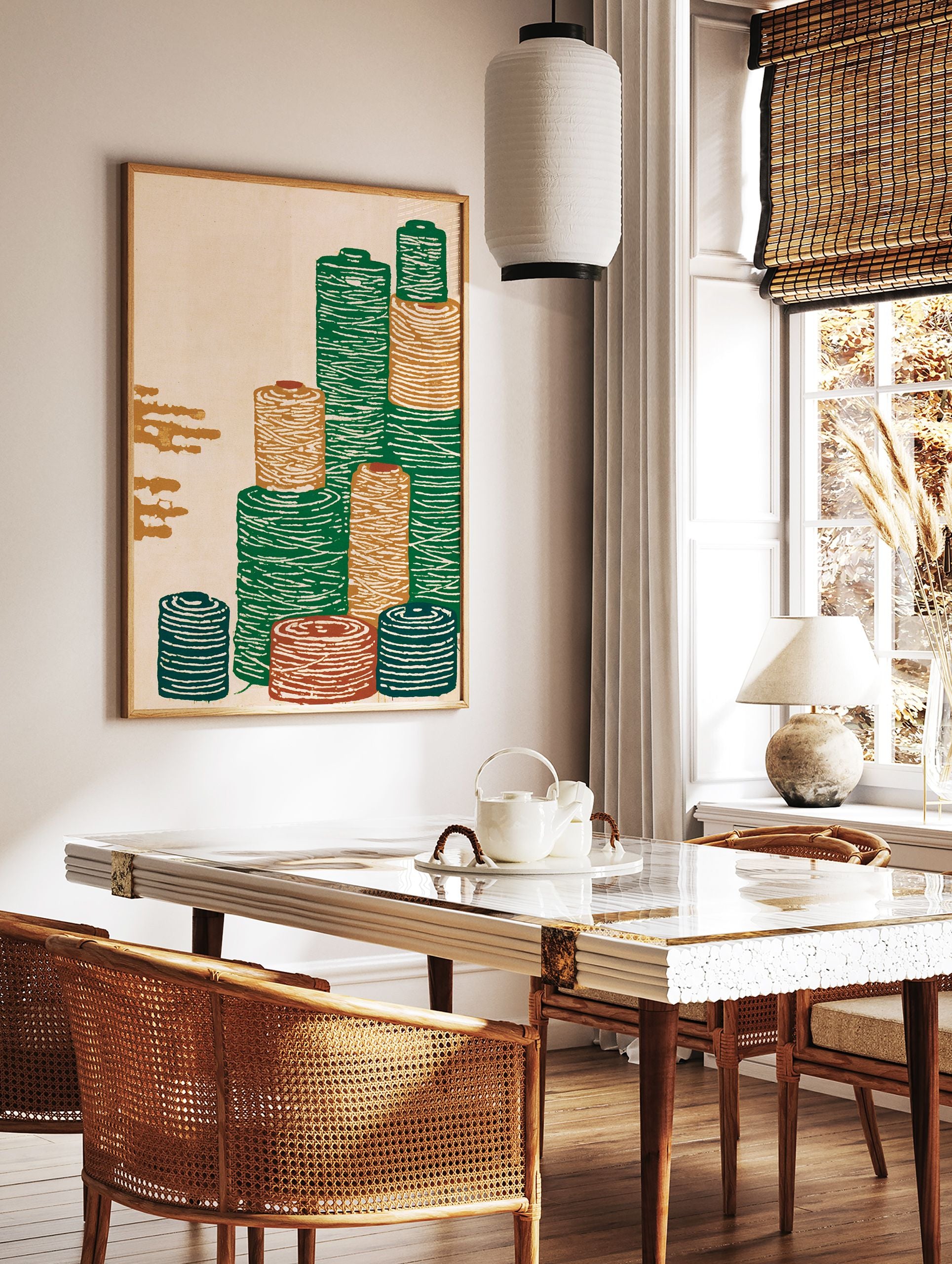 Illustrative textile spool wall art print showing stacked green, orange, and blue thread bobbins on a cream background - Image 2