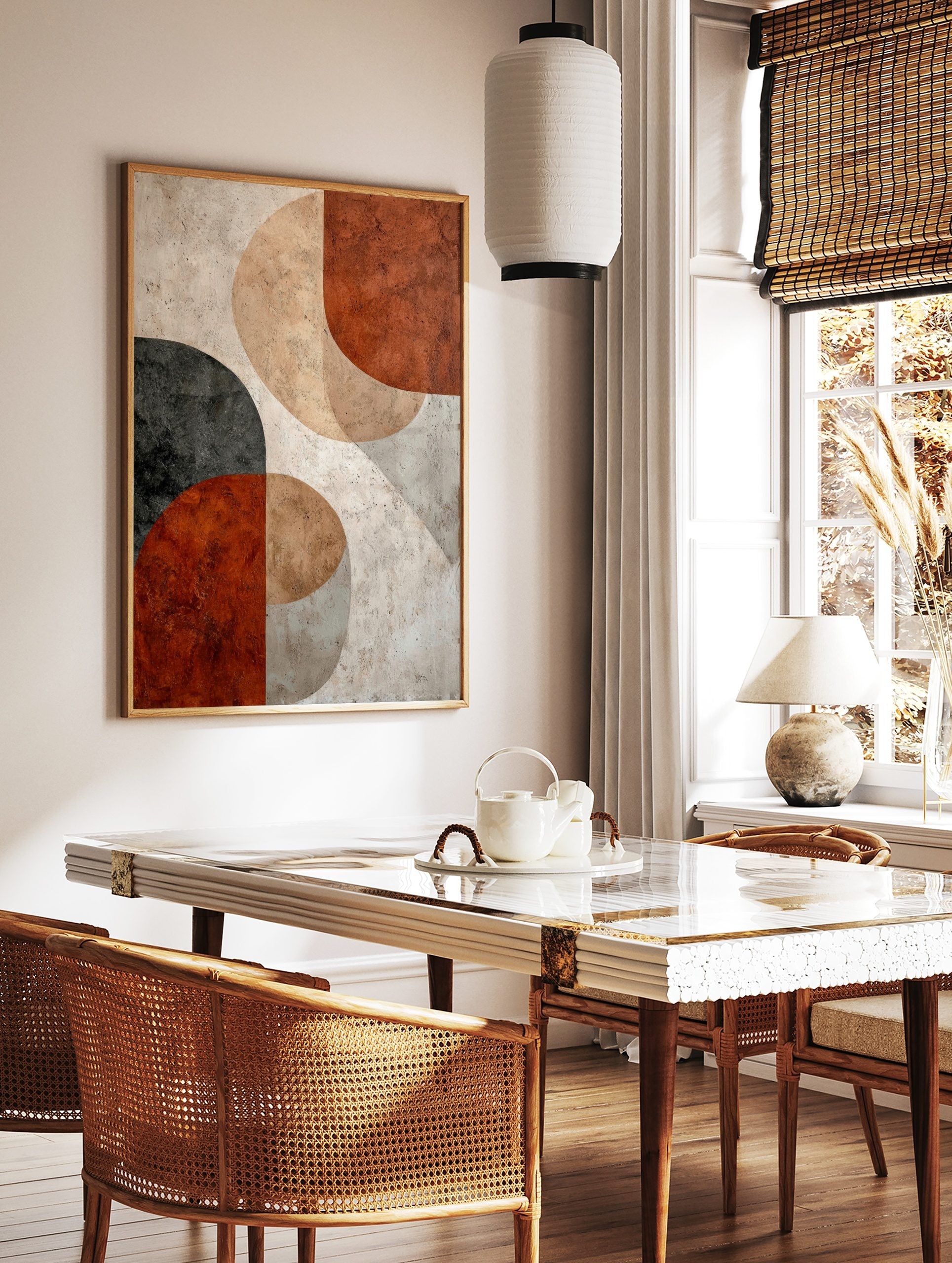 Abstract geometric art print with textured semi-circles in rust, beige, charcoal, and off-white, in a styled room mockup