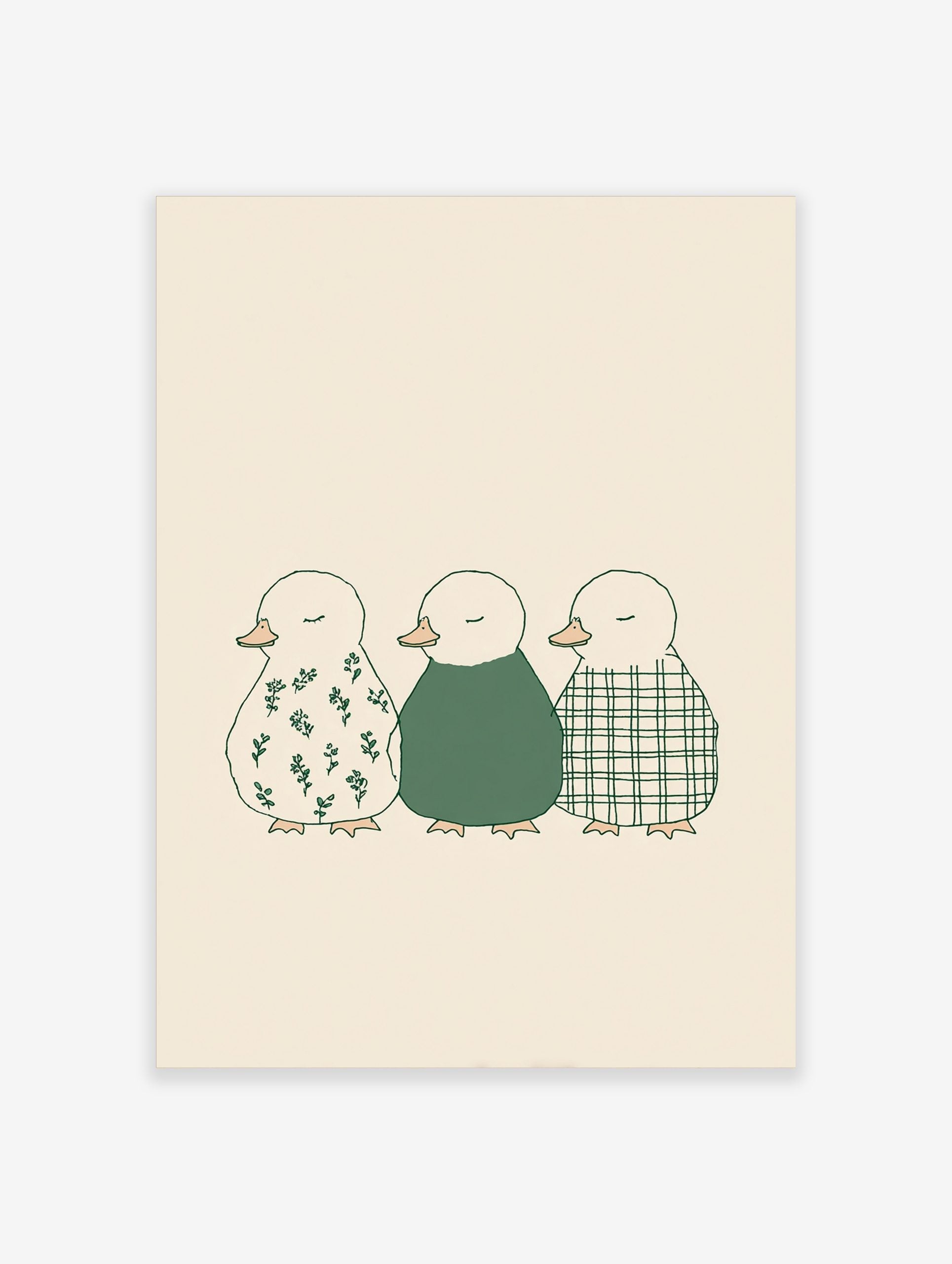 Illustration of three ducklings in a row, with floral, solid green, and plaid patterns on a beige background