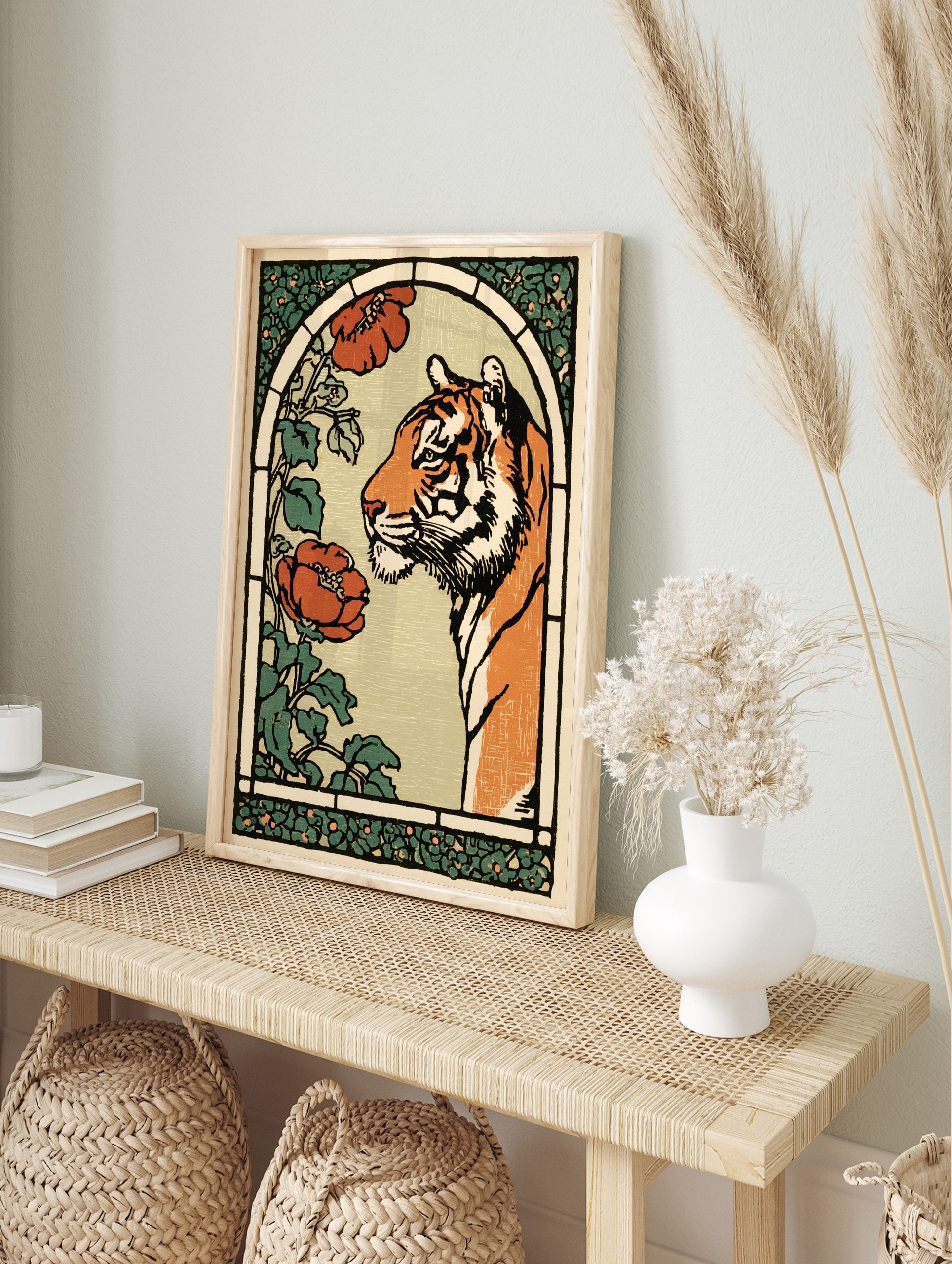 Art Nouveau style illustration of an orange tiger with red poppies and green foliage in an, in an alternate framed mockup