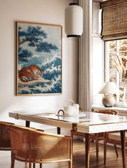 Japanese art poster featuring a tiger resting beside blue waves and a pine tree on a light background. - Image 2