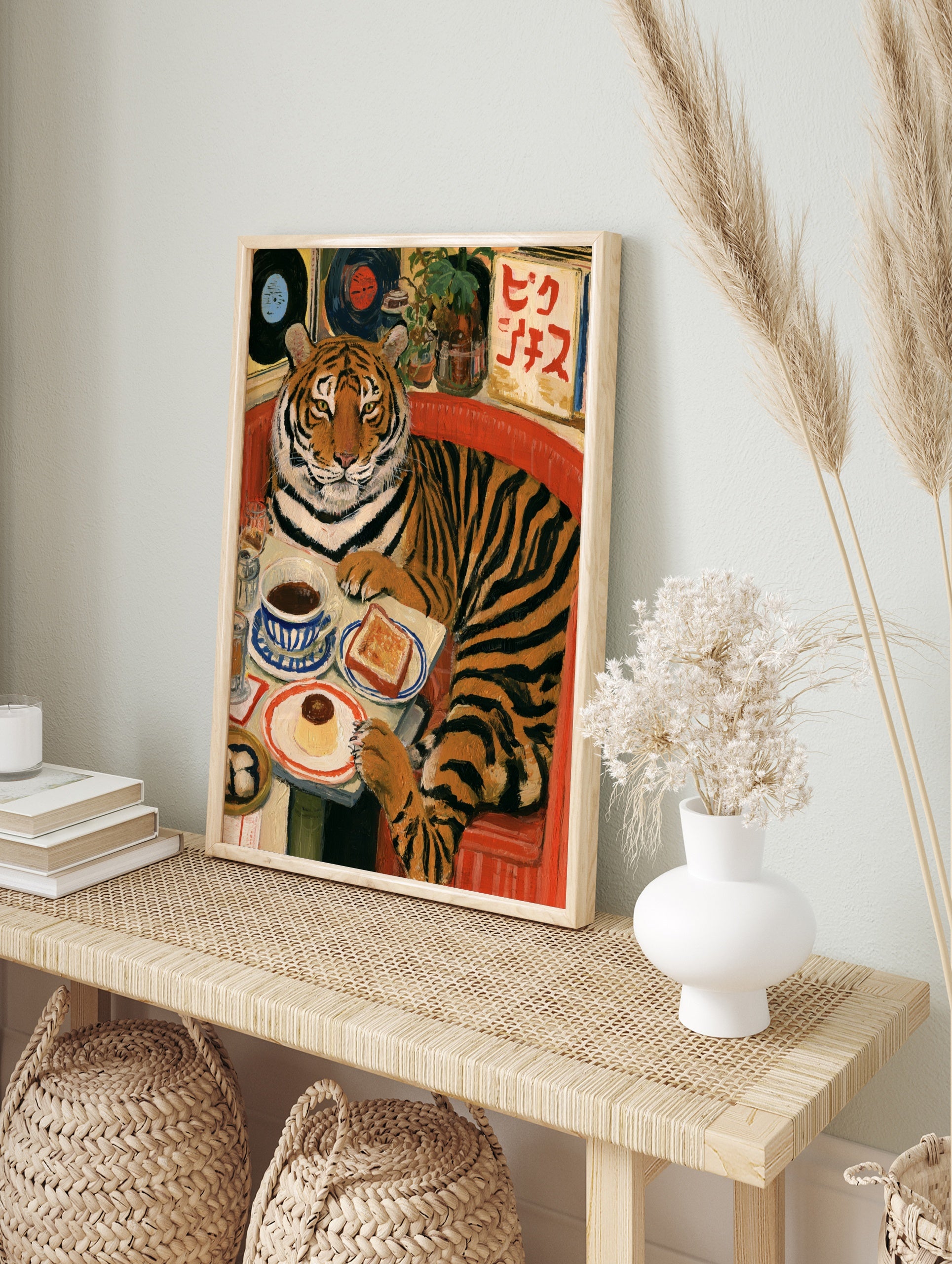 Tiger sitting in a red diner booth with coffee and pudding, with vinyl records and Japanese, in an alternate framed mockup