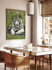 White tiger with black stripes resting in green jungle foliage, lino print style wall art, in a styled room mockup