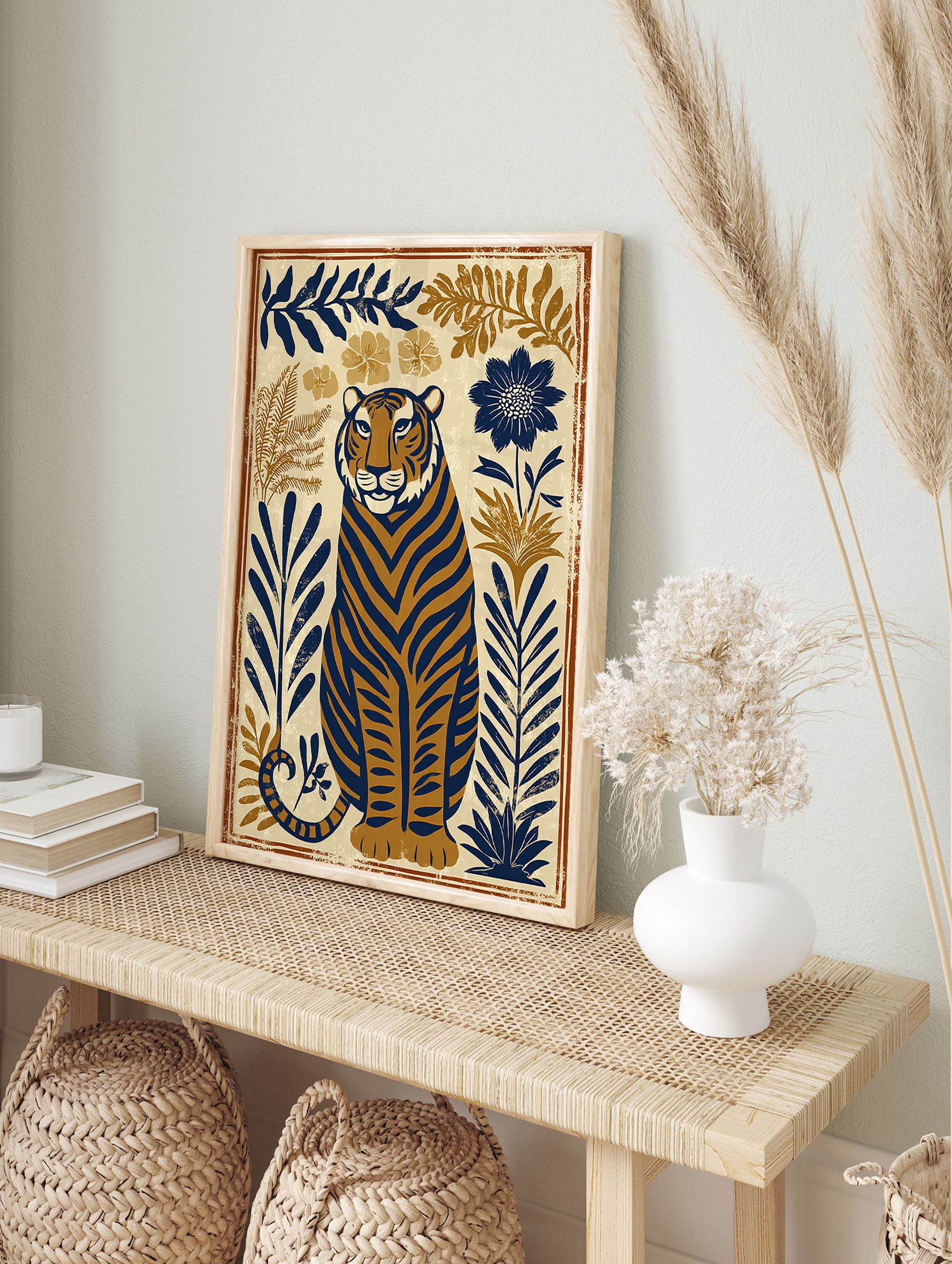 Tiger poster featuring a stylized blue and brown tiger sitting amongst botanical leaves and flowers on a cream background. - Image 4
