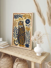 Tiger poster featuring a stylized blue and brown tiger sitting amongst botanical leaves and flowers on a cream background. - Image 4