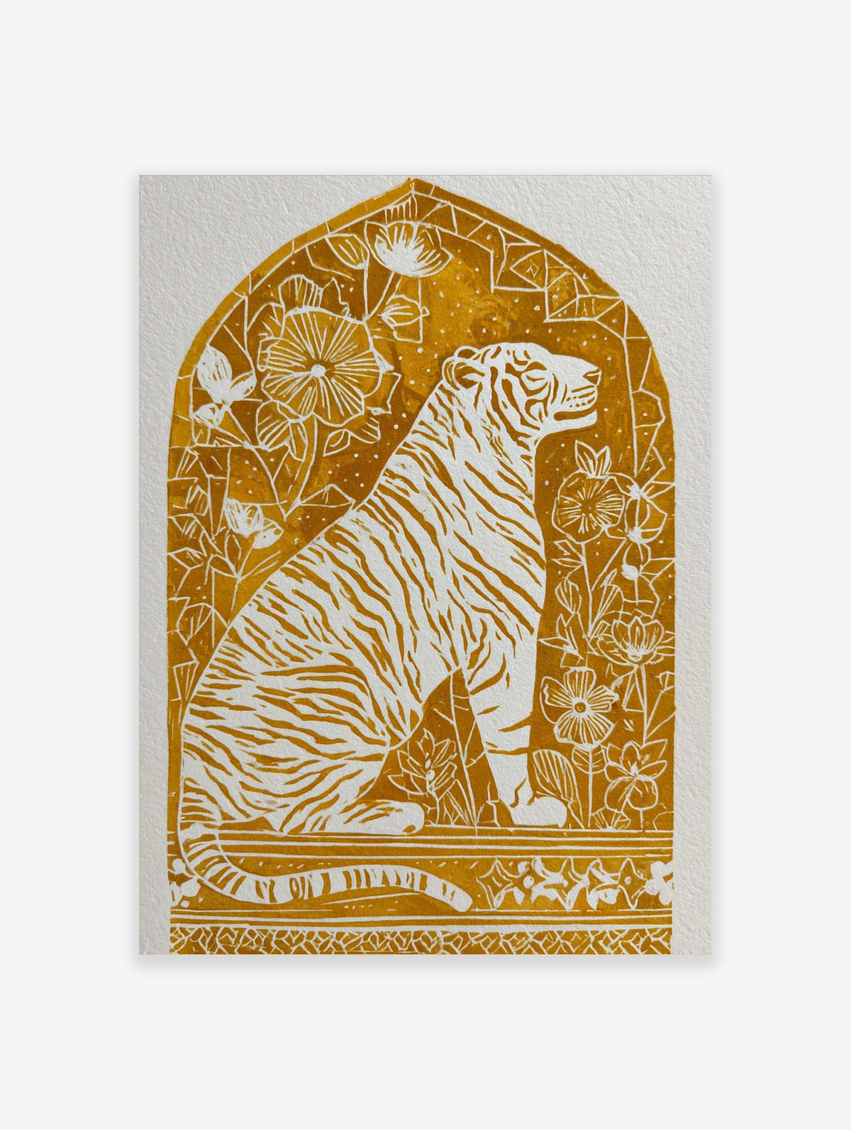 Illustrative golden tiger art print with white stripes and botanical details within an arched frame