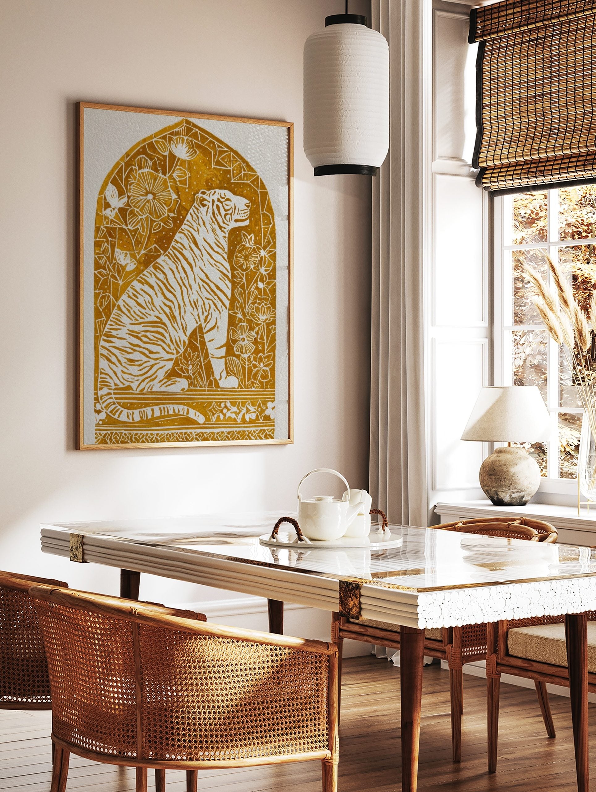 Illustrative golden tiger art print with white stripes and botanical details within an arched frame, in a styled room mockup