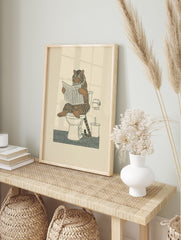 Whimsical tiger wall art print showing a tiger sitting on a toilet reading a newspaper, in an illustrative style. - Image 3