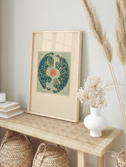 Illustrative print with two blue tigers in a circular yin-yang composition around an orange, in an alternate framed mockup