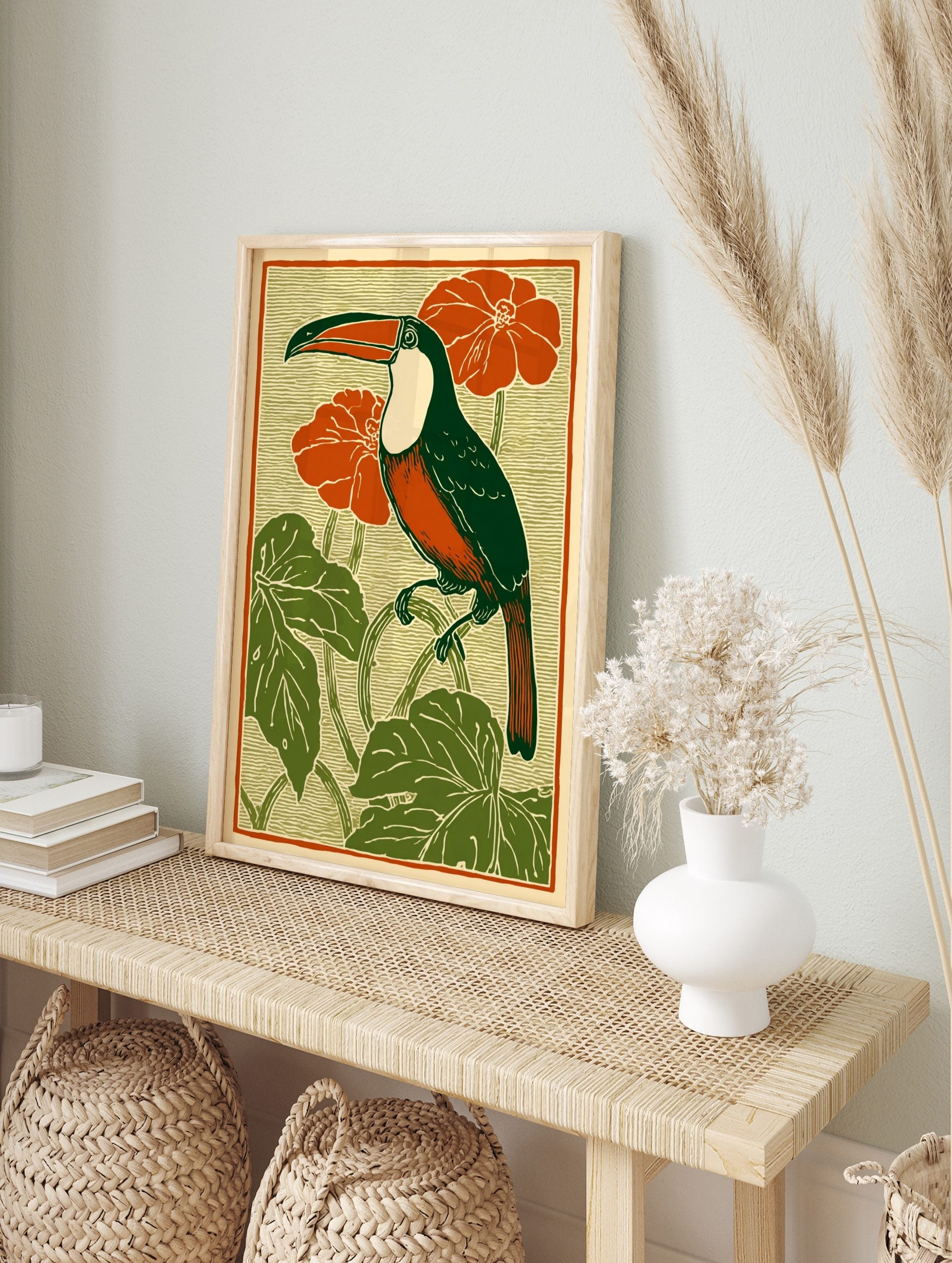 Art Nouveau style illustration of a toucan bird with green body, orange chest, red flowers, in an alternate framed mockup