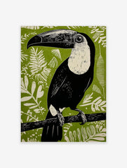 Black and white Toucana toucan linocut art print on a vibrant green jungle foliage background, perched on a branch