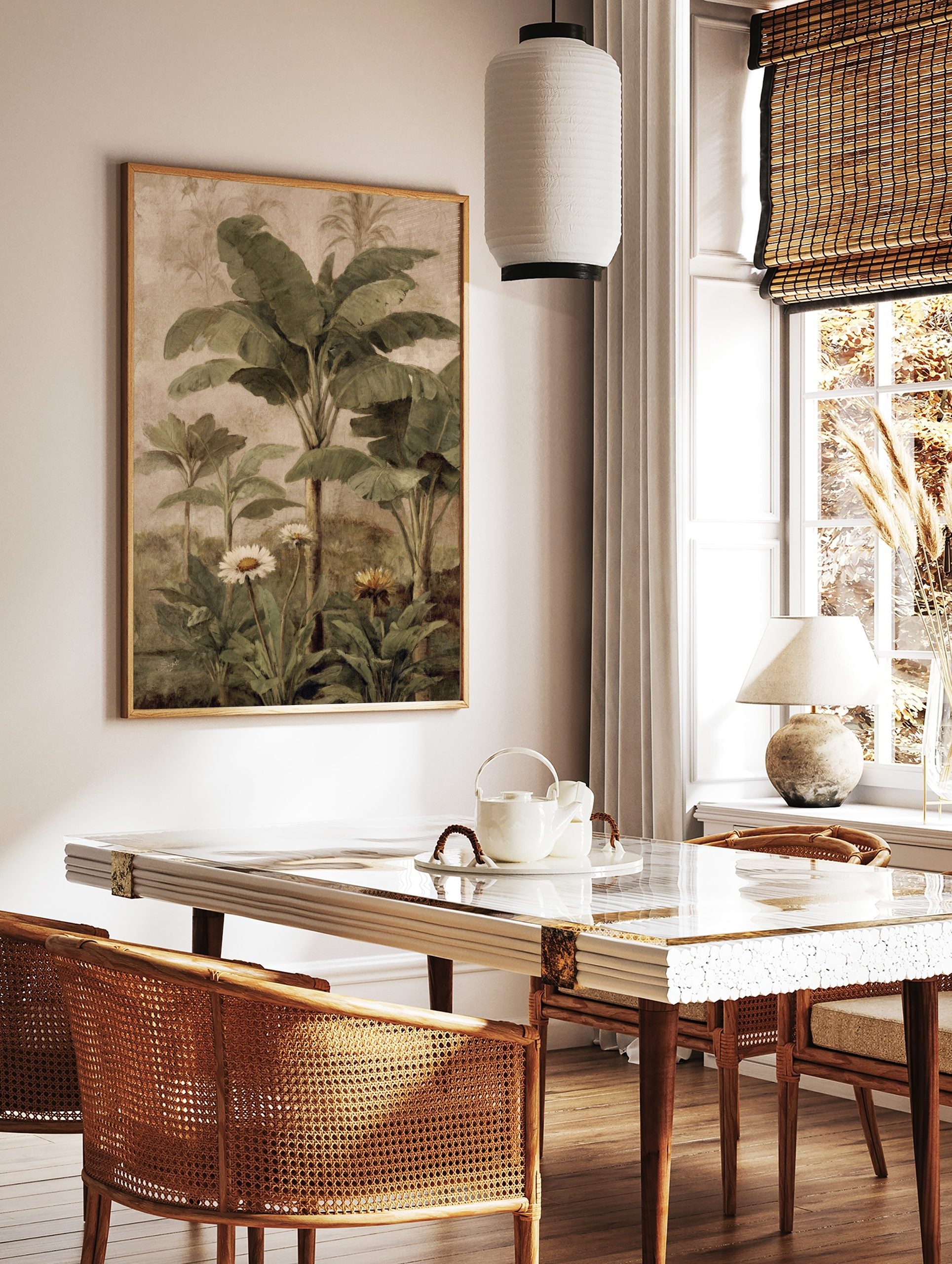 Tropical botanical painting with green banana leaves, palm trees, white daisies, and yellow flower, in a styled room mockup