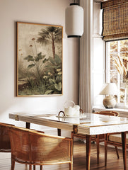 Vintage tropical botanical illustration with palm tree, large green leaves, and reddish-brown, in a styled room mockup