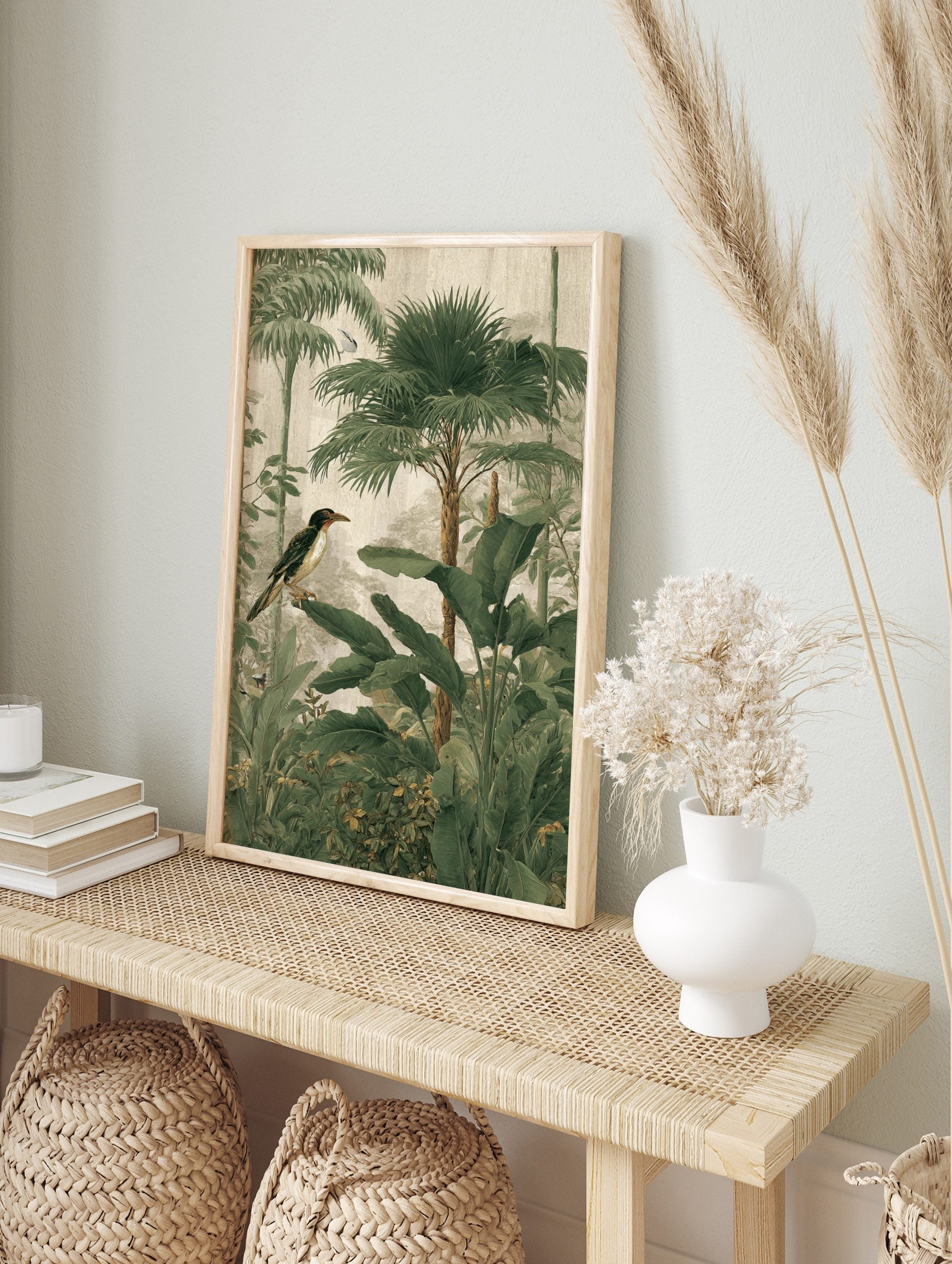 Tropical jungle wall art with a bird, palm trees, and lush green botanical foliage, in an alternate framed mockup