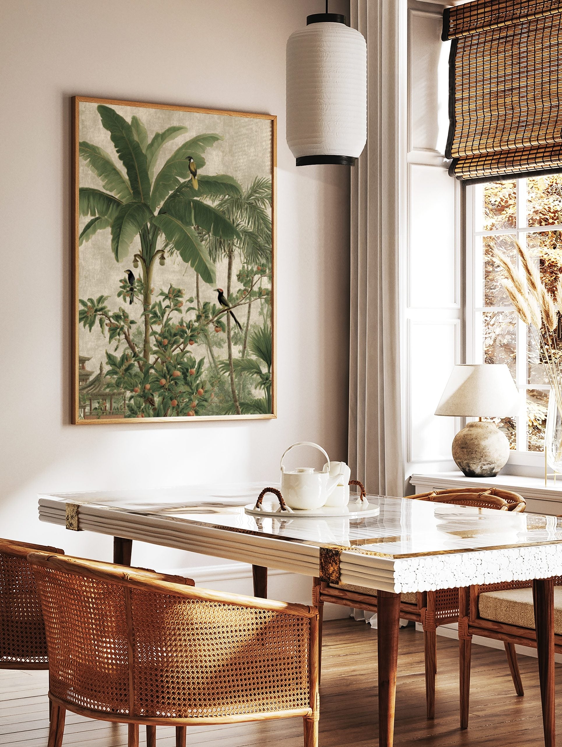 Tropical jungle landscape wall art with banana trees, palm fronds, exotic birds, and a pagoda, in a styled room mockup