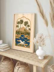 Illustrative tropical landscape print with palm trees, mountains, and a lake inside an ornate, in an alternate framed mockup