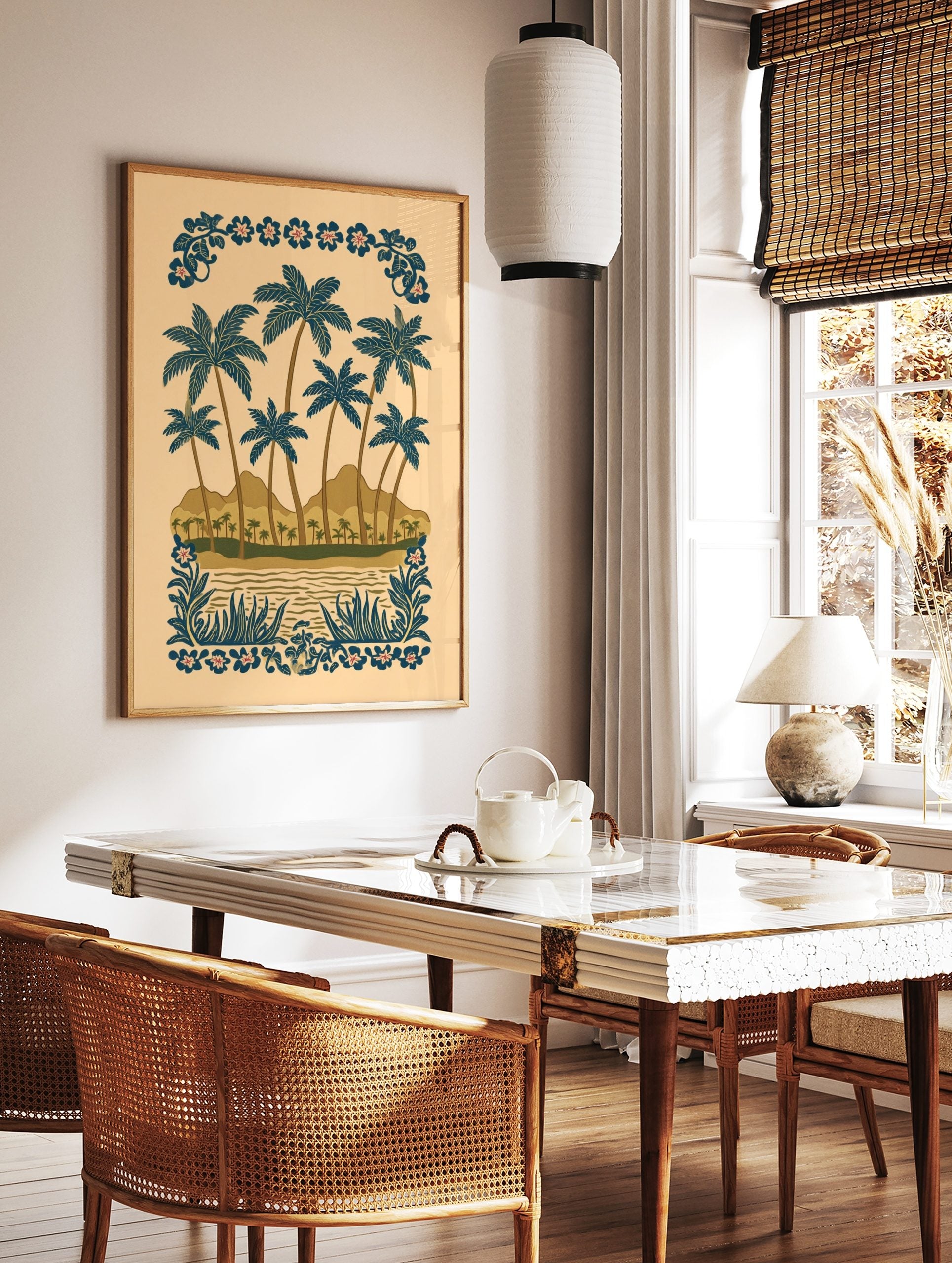 Illustrative tropical beach scene with blue palm trees, brown mountains, water, and decorative, in a styled room mockup