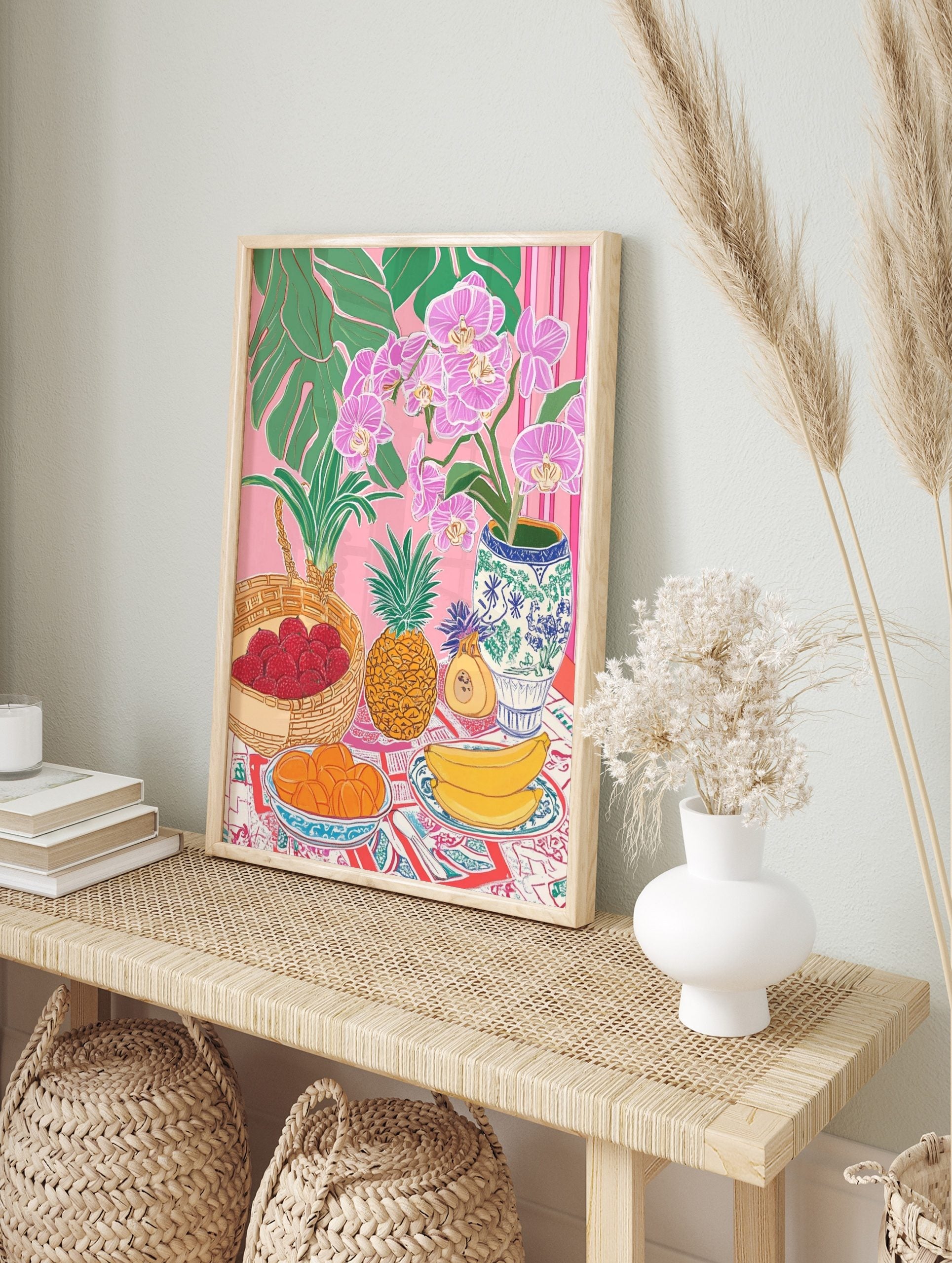 Tropical still life illustration with pink orchids, green leaves, lychees, pineapple, in an alternate framed mockup