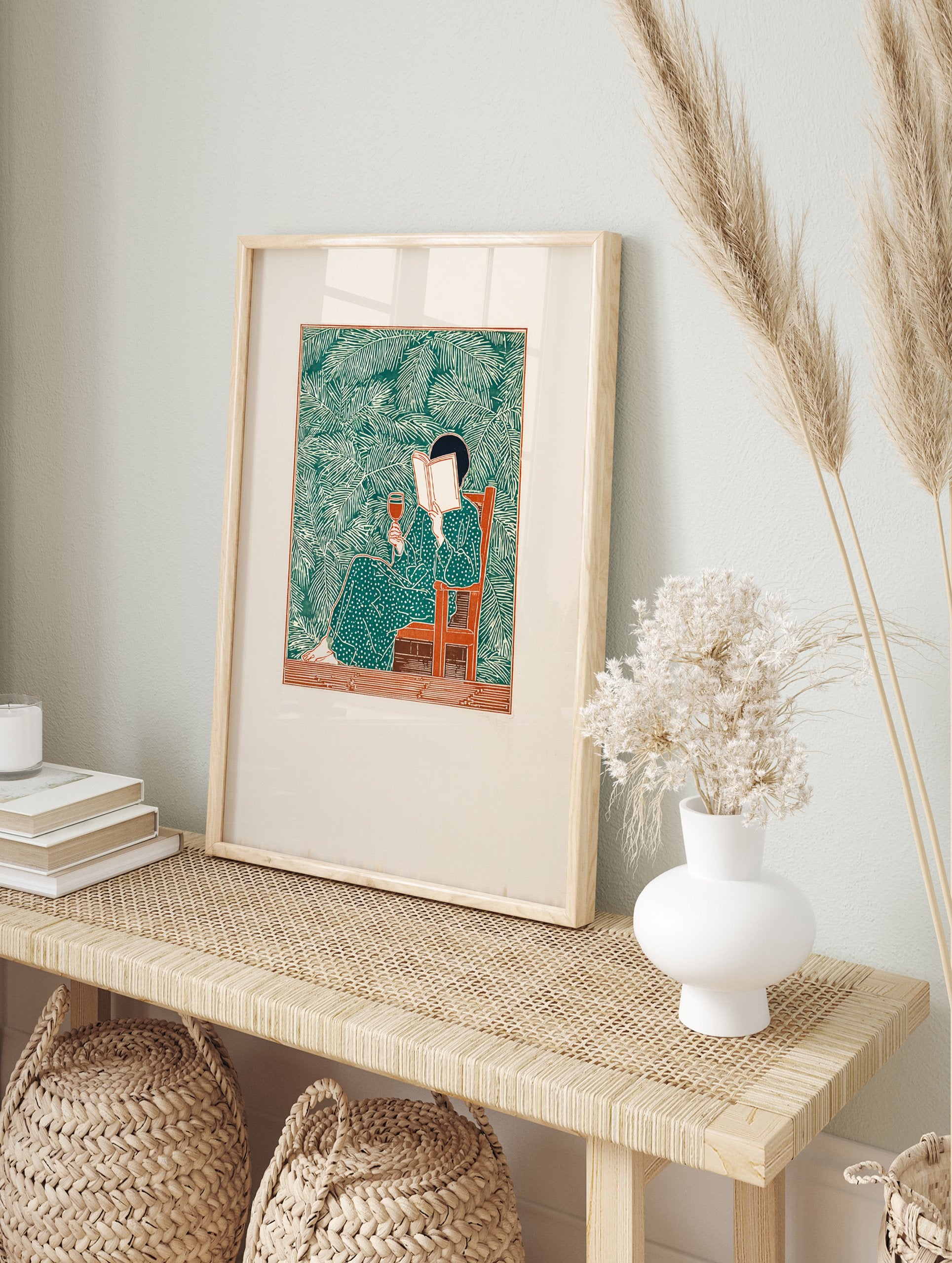 Illustration of a woman in a green polka dot dress reading a book and holding wine, surrounded by green palm leaves. - Image 3