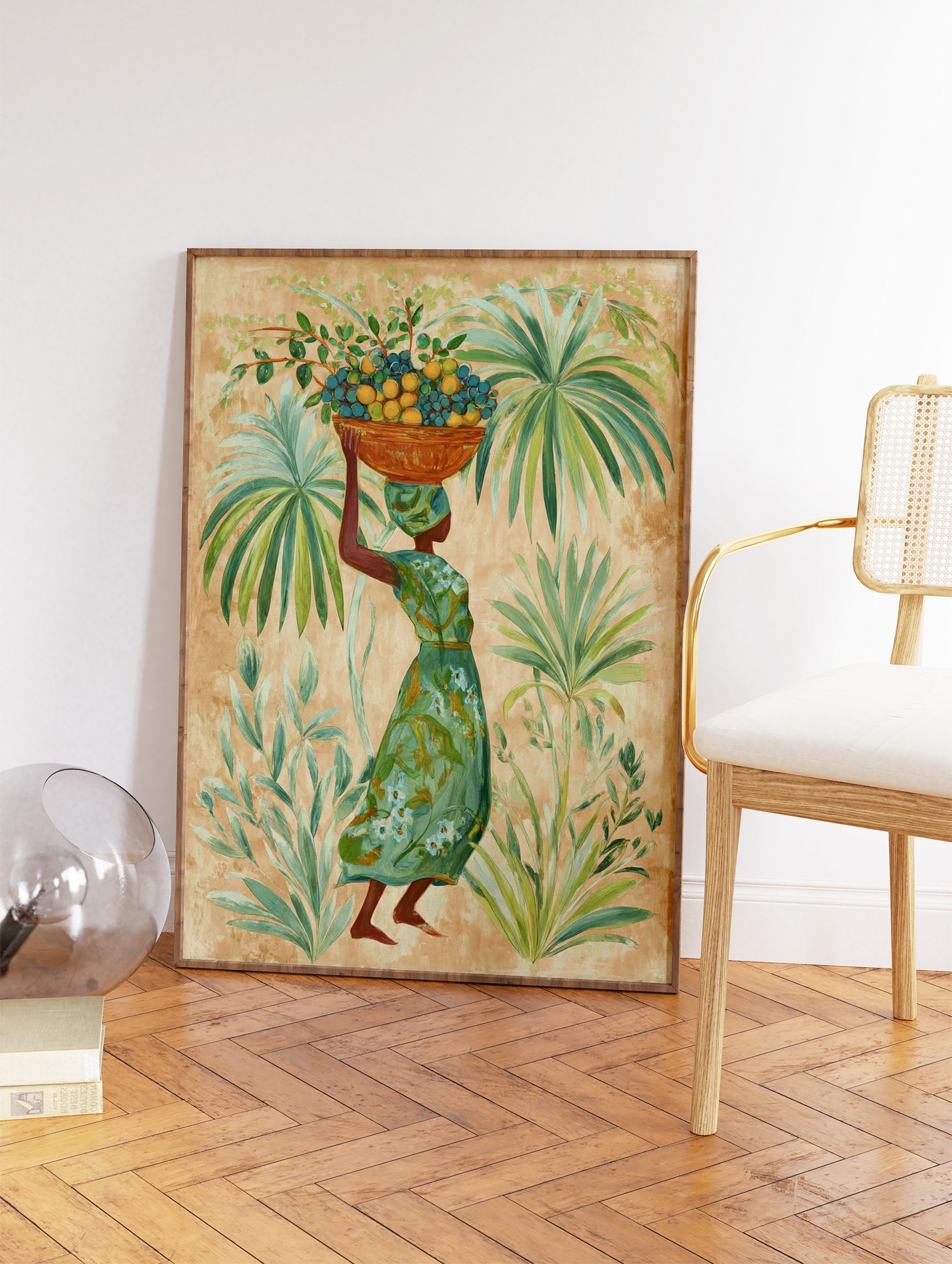 Tropical Woman Wall Art featuring a woman carrying a basket of fruit on her head, surrounded by lush green palm leaves. - Image 2