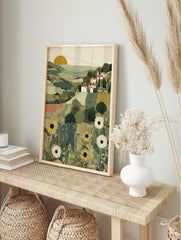 Illustrative Tuscan landscape art print with green hills, white village houses, cypress, in an alternate framed mockup