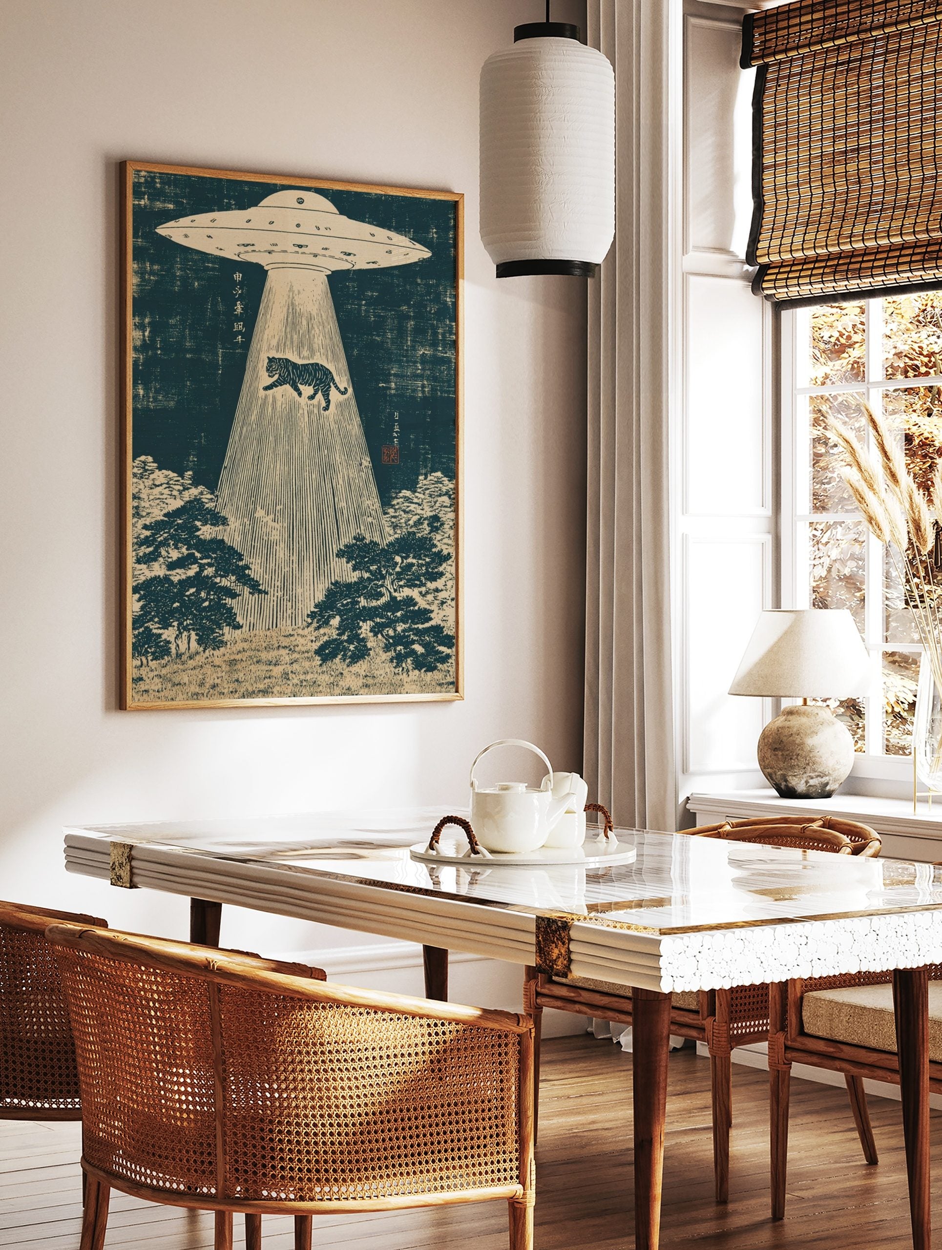 UFO abducting a tiger in a Japanese woodblock print style, with dark blue sky and beige forest, in a styled room mockup