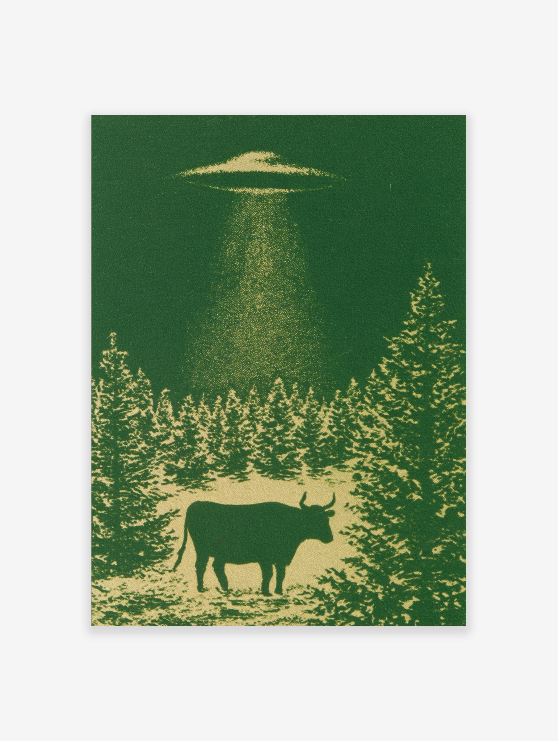 Monochromatic green wall art print of a cow being abducted by a UFO above a forest silhouette