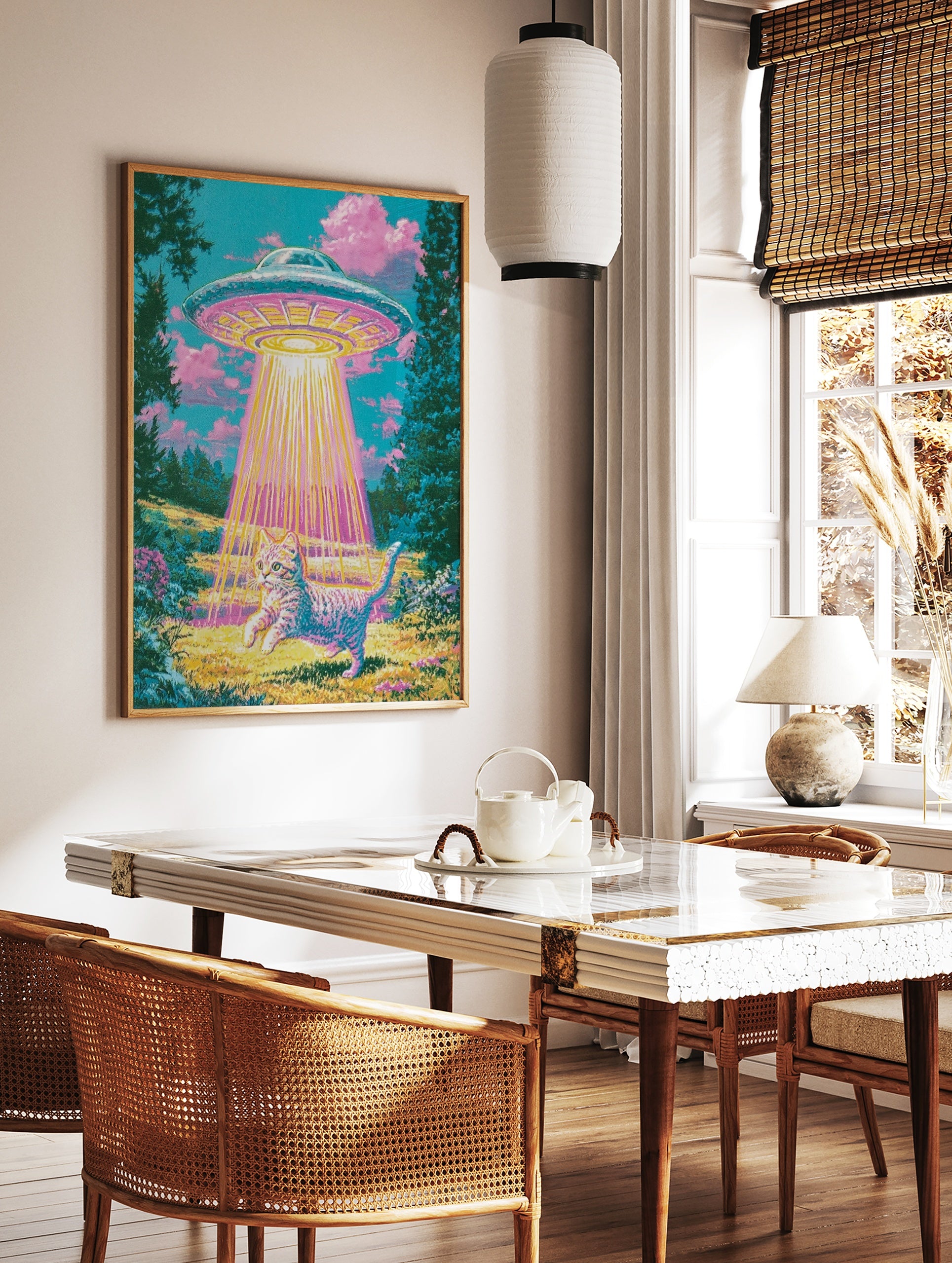 Surreal art print of a tabby cat being abducted by a glowing UFO in a vibrant, retro-styled, in a styled room mockup