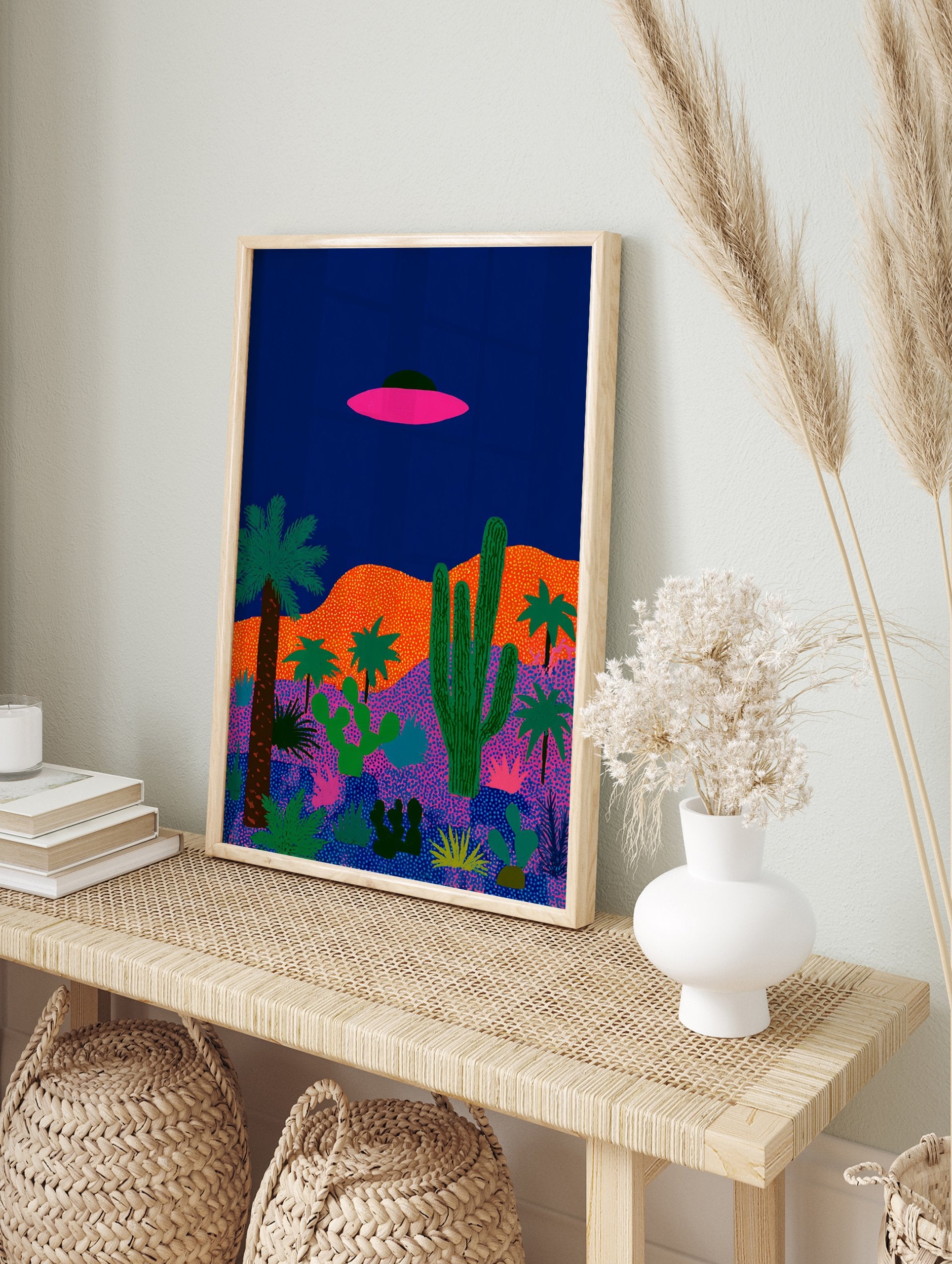 Illustrated UFO desert landscape poster with a pink flying saucer, green cacti, and palm trees against a dark blue sky. - Image 4