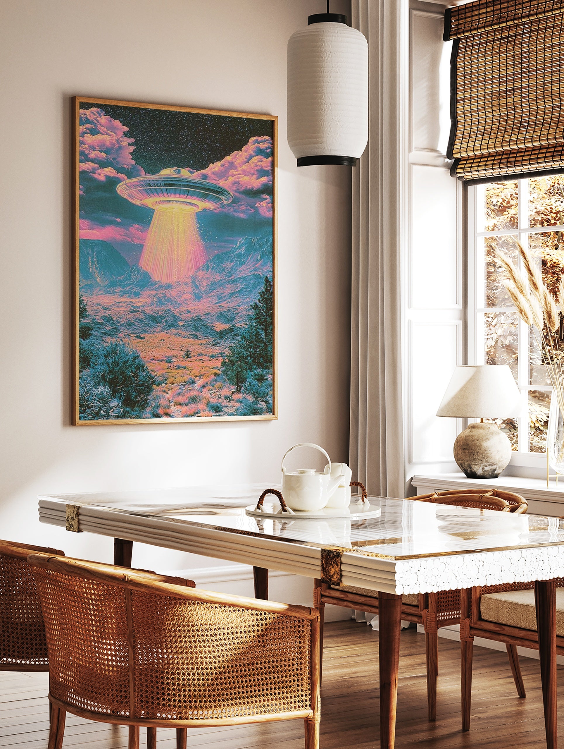 Psychedelic UFO desert landscape wall art print with vibrant pink and teal colours and a glowing, in a styled room mockup