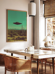 UFO flying saucer hovering over a desert landscape with saguaro cacti under a teal sky, retro sci-fi art print. - Image 3