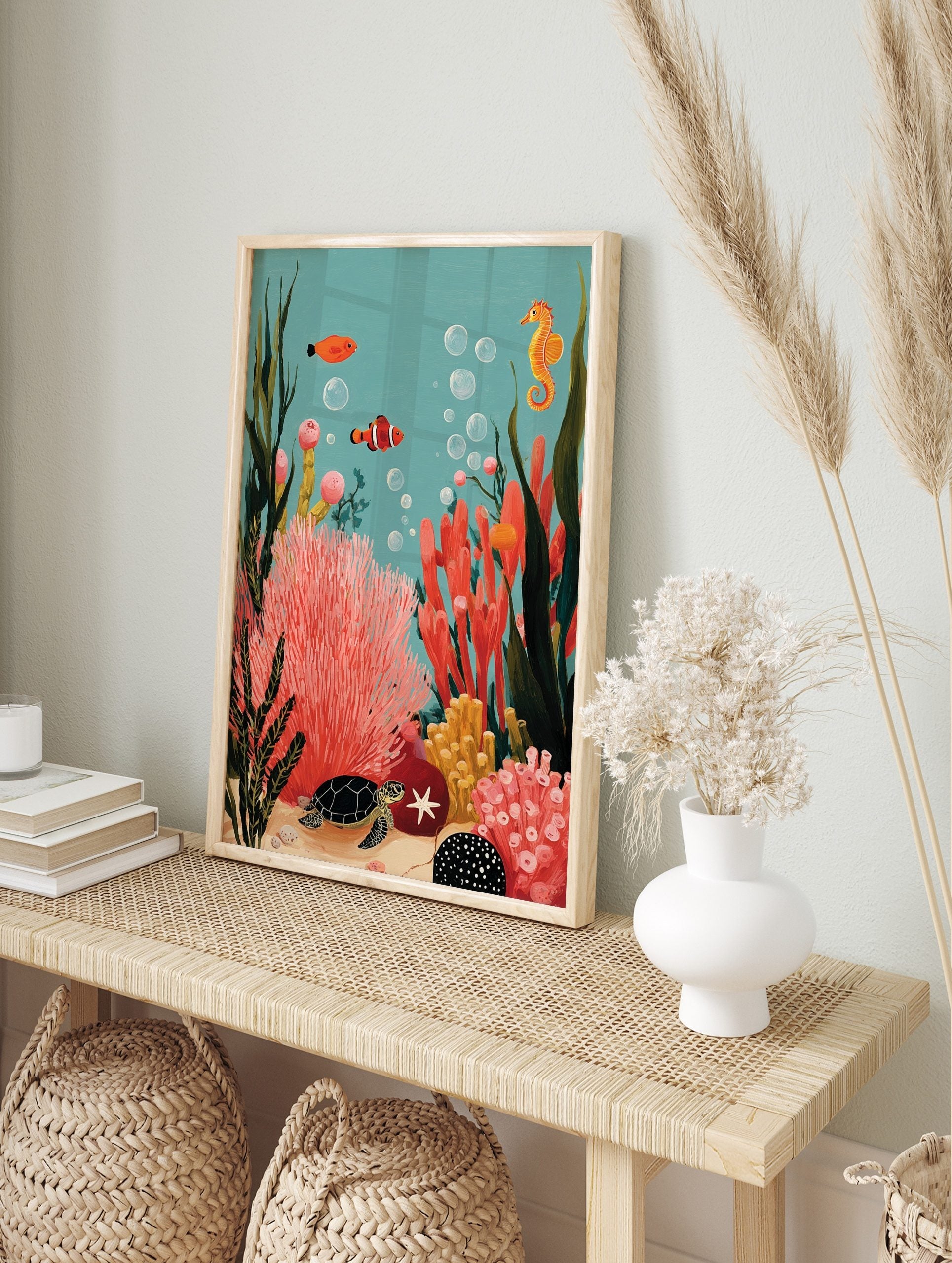 Illustrative underwater scene with clownfish, seahorse, sea turtle, and colourful coral reef, in an alternate framed mockup