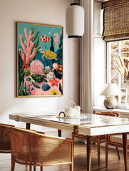 Illustrative underwater scene with two sea turtles, clownfish, seahorse, and colourful coral reef, in a styled room mockup