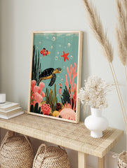 Colourful illustrative print of an underwater ocean scene with a sea turtle, clownfish, in an alternate framed mockup