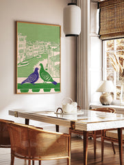 Illustrated Venice pigeon wall art with a purple and green pigeon on a balcony overlooking a canal and buildings. - Image 2