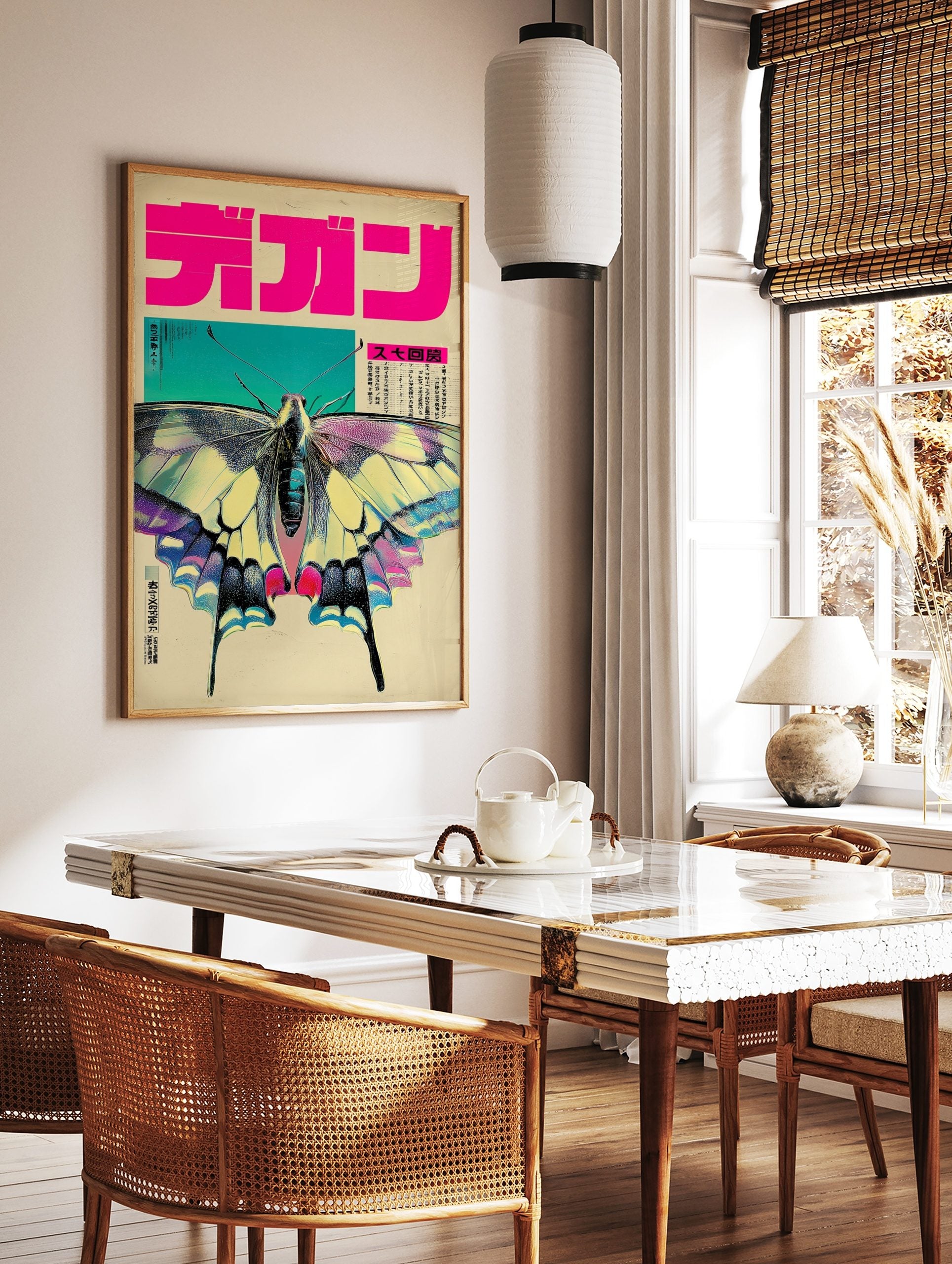 Vibrant butterfly with yellow, pink, blue wings, black body, teal background, and bold pink, in a styled room mockup