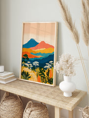 Vibrant illustrative landscape wall art with blue mountains, orange hills, green forests, and yellow botanical foreground. - Image 3