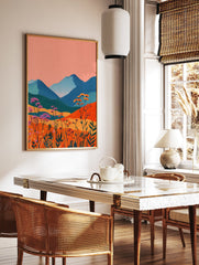 Vibrant landscape painting with blue mountains, orange hills, and pink and orange wildflowers under a peach sky. - Image 2