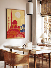 Illustrative print of a red mosque with multiple domes and minarets, yellow sky, blue palm trees, in a styled room mockup