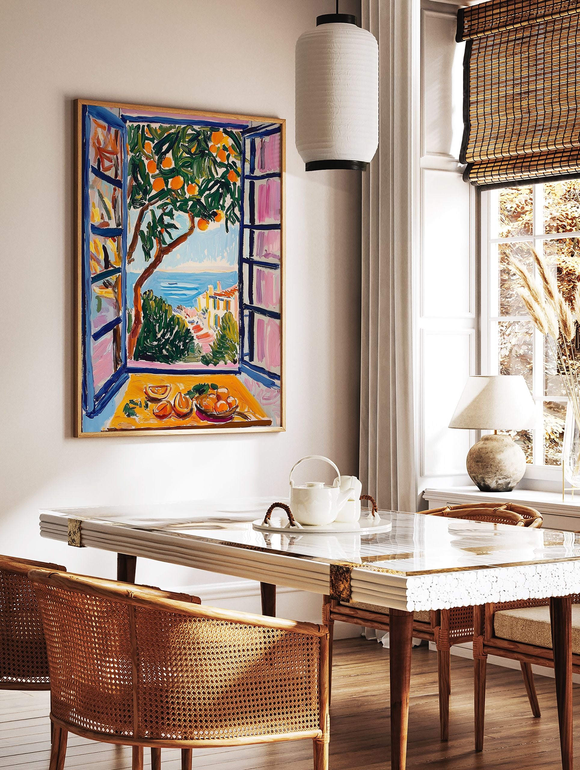 Vibrant orange tree poster with a coastal view of the sea and town through a window, featuring a still life of oranges. - Image 2
