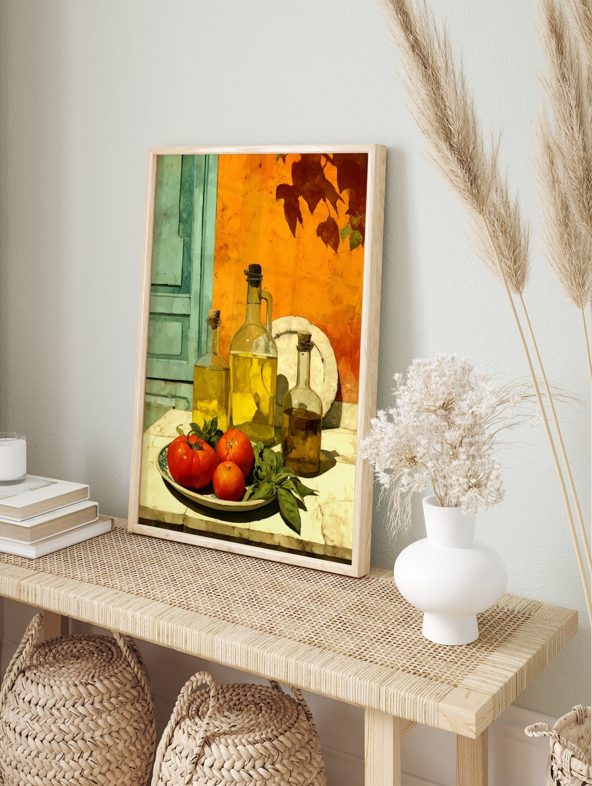 Still life print with olive oil bottles, red tomatoes, and basil against an orange wall and, in an alternate framed mockup
