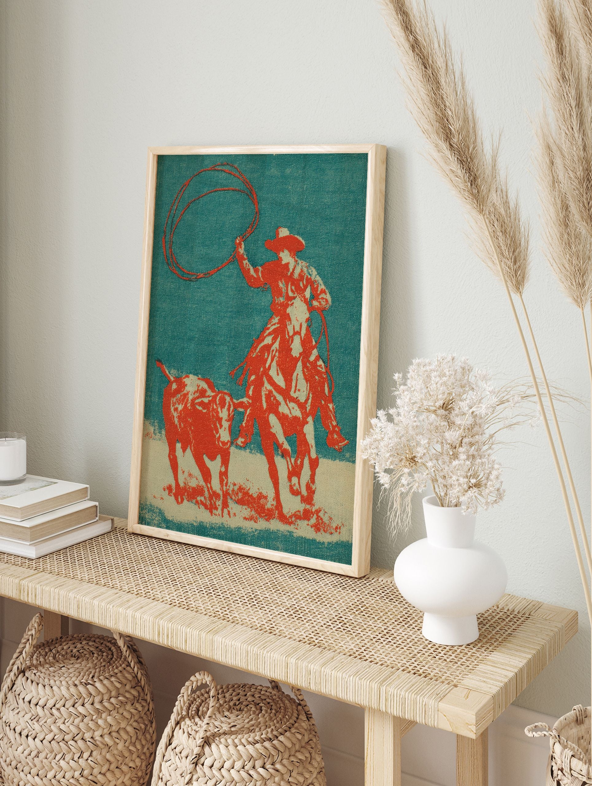 Vintage cowboy roping poster featuring a cowboy on a horse lassoing a calf, set against a teal and orange background. - Image 4