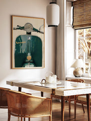 Close-up front view of a dark green vintage Vespa scooter with chrome headlight and 'Vespa' script, in a styled room mockup