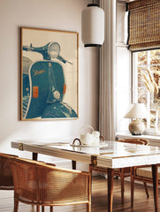 Illustrative vintage blue-green Vespa scooter wall art print with headlight and 'Vespa' logo, in a styled room mockup